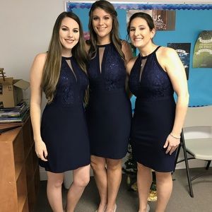 Beautiful dark blue dress size 12 but fits like an 8